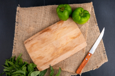 A Cutting Board Is Scratched and Chipped